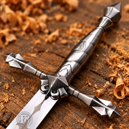 Close-up of Alucard sword handle showing sculpted metallic grip, angular crossguard and geometric pommel