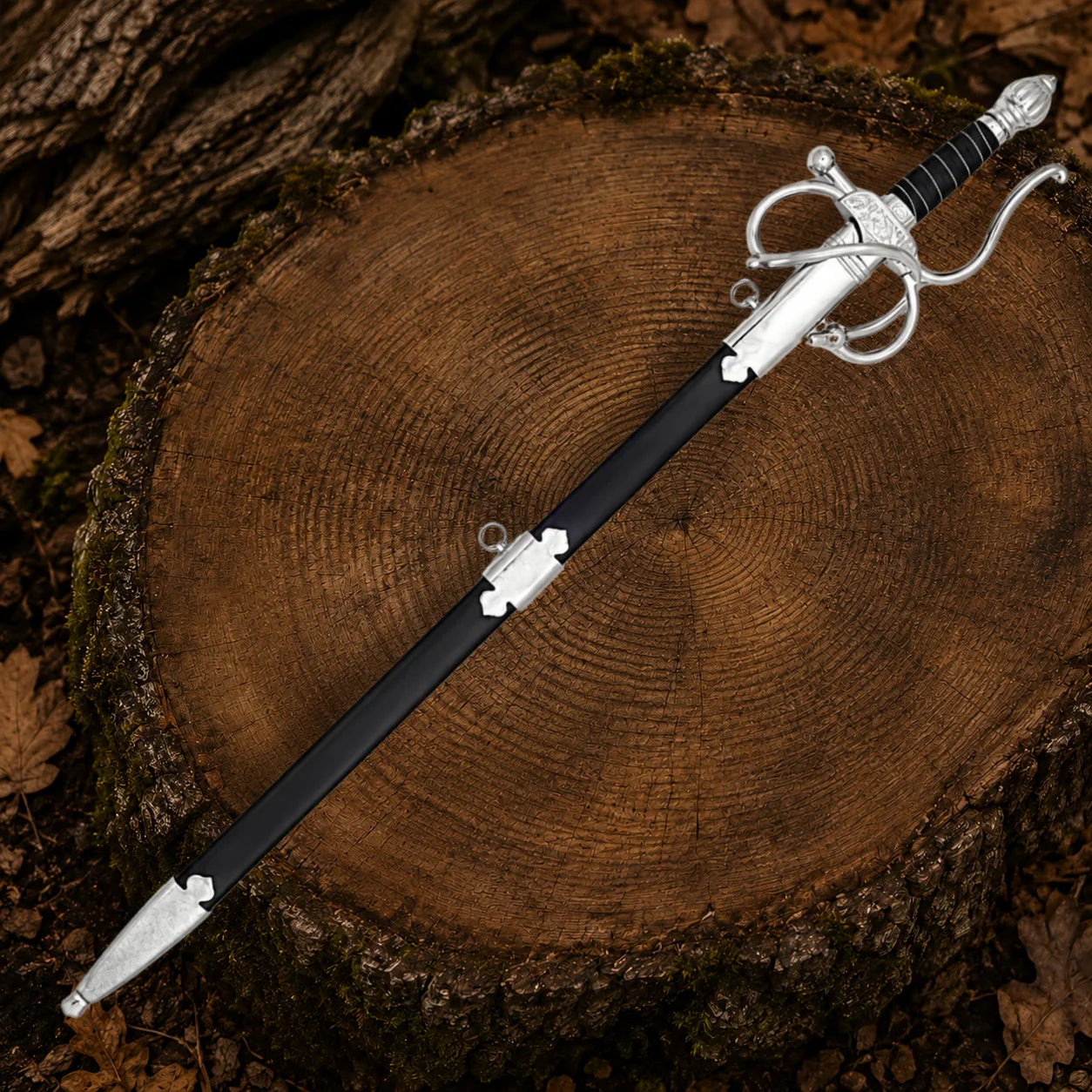 Full-length El Cid Rapier Sword with polished stainless steel blade, black grip and ornate silver guard displayed outdoors