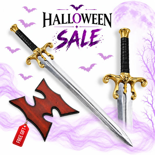 He-Man 1987 Power Sword replica with ornate gold skull crossguard, silver blade, black grip and red display plaque in Europe Mark's Halloween sale.