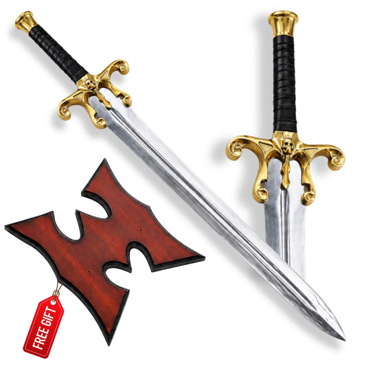 He-Man 1987 Power Sword shown from two angles on white with gold skull guard, black grip and red-brown wall plaque
