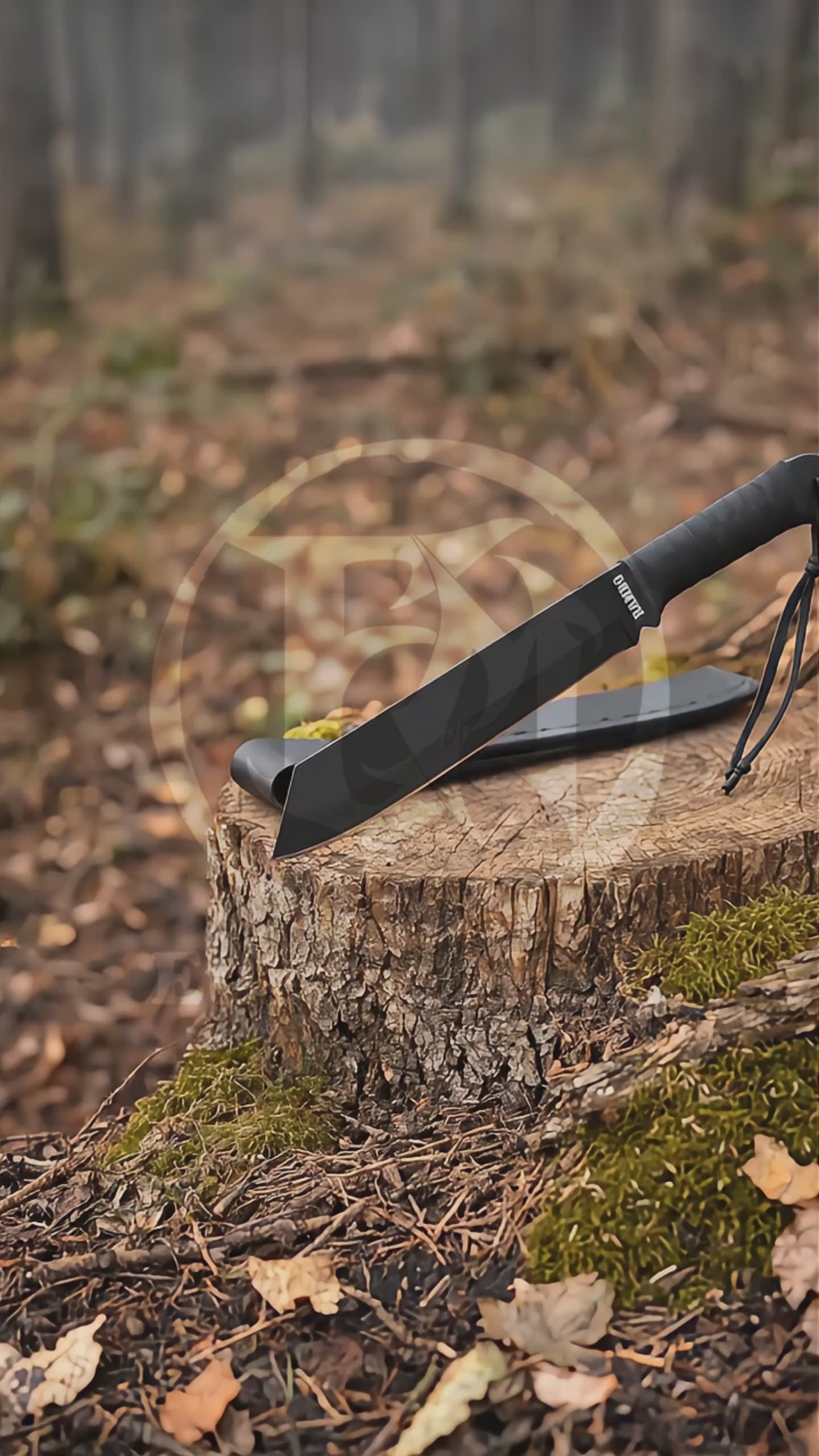 Product showcase video featuring the Rambo IV movie prop collectible with matte black decorative blade, wrapped handle, wrist straps and stitched black display sheath
