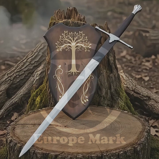Vertical product showcase video featuring the Braveheart William Wallace Sword Prop displayed with a decorative wall plaque on a woodland tree stump, followed by a masked model in black gloves presenting its long silver blade, straight crossguard and dark wrapped handle.