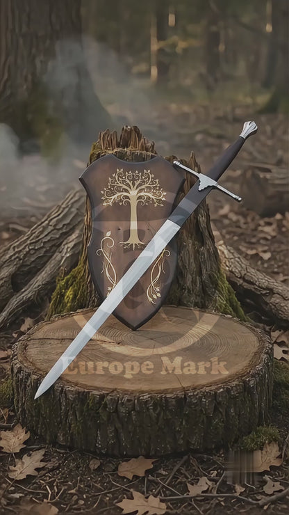 Vertical product showcase video featuring the Braveheart William Wallace Sword Prop displayed with a decorative wall plaque on a woodland tree stump, followed by a masked model in black gloves presenting its long silver blade, straight crossguard and dark wrapped handle.