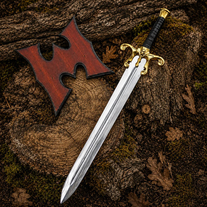 Vertical product video showing the He-Man Power Sword in woodland, including a gloved-hand presentation and close views of the gold skull guard and silver blade.