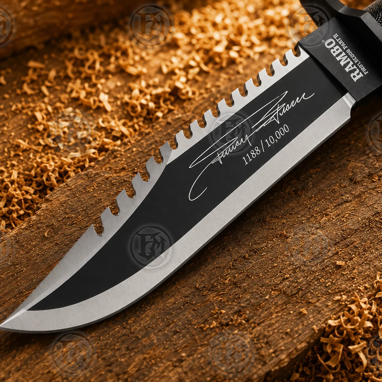 Close-up of matte-black Rambo Part II blade with sawback spine, signature graphic and 1188/10,000 numbering.